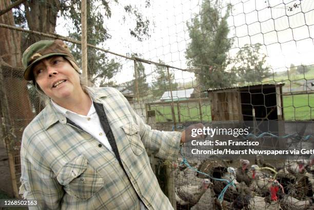 Turkeyfarm25191_ckh.jpg Farm owner,Sylvia Mavalwalla, in front of a coop of Narragansett turkeys.An overview of the turkey farming business in...