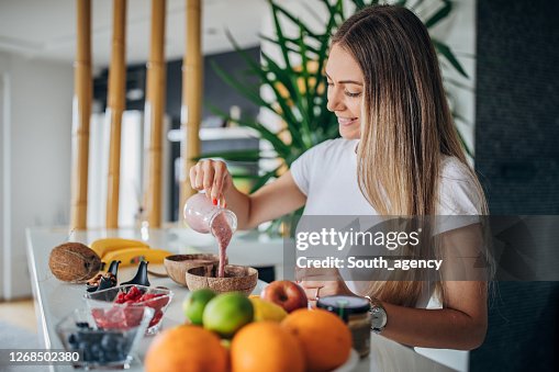 Beautiful woman preparing healthy breakfast Beautiful woman preparing healthy breakfast