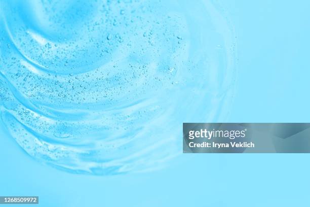 texture of transparent gel or serum, hyaluronic acid with bubbles. - enzymes cosmetics foto e immagini stock