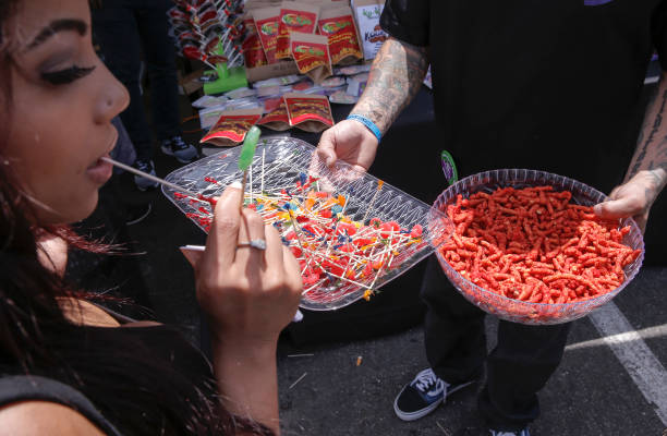 Marijuana edibles, gummies and fire cheese snacks are distributed as vendors gather for Cannabis Cup, the world's largest marijuana trade show taking...