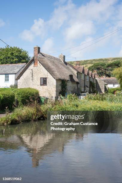 sutton poyntz - thatched cottage stock pictures, royalty-free photos & images