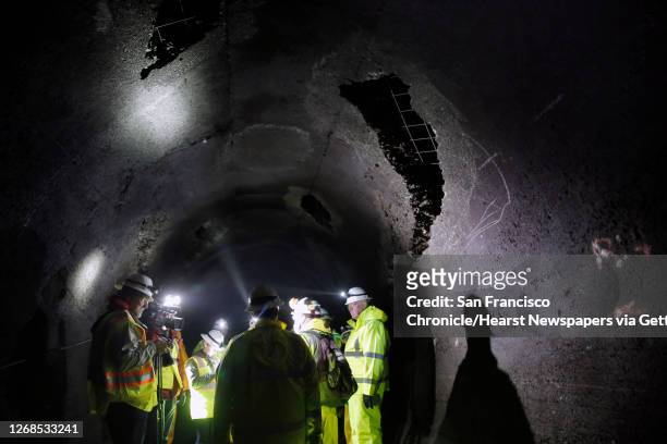 Media tour stops to observe the repair sites inside Mountain Tunnel, which transports water from the Hetch Hetchy Reservoir near Groveland, Ca., as...