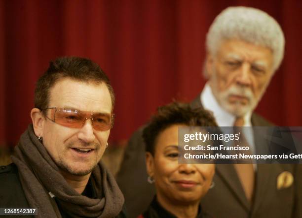 At Allen Temple Baptist Church, in Oakland, international AIDS activist and U2 lead singer , Bono, joins U.S. Rep. Barbara Lee and Oakland Mayor Ron...