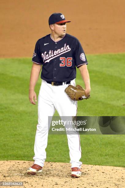 Will Harris of the Washington Nationals pitches during a baseball game against the Miami Marlins at Nationals Park on August 21, 2020 in Washington,...