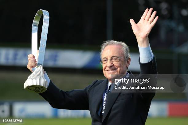 Real Madrid President Florentino Perez pictured with the trophy following Madrid's 3-2 victory in the UEFA Youth League Final against Benfica at...