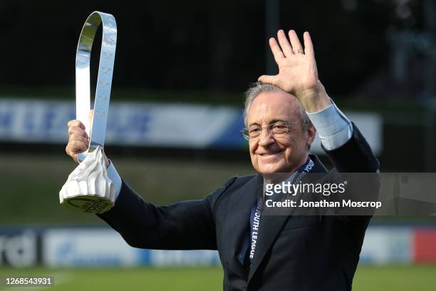 Real Madrid President Florentino Perez pictured with the trophy following Madrid's 3-2 victory in the UEFA Youth League Final against Benfica at...