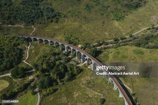 high angle shot of glenfinnan viaduct, scotland, united kingdom - glenfinnan viaduct stock pictures, royalty-free photos & images