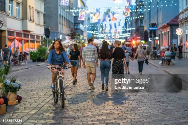 terbatas street in riga on a summer evening - riga stock pictures, royalty-free photos & images