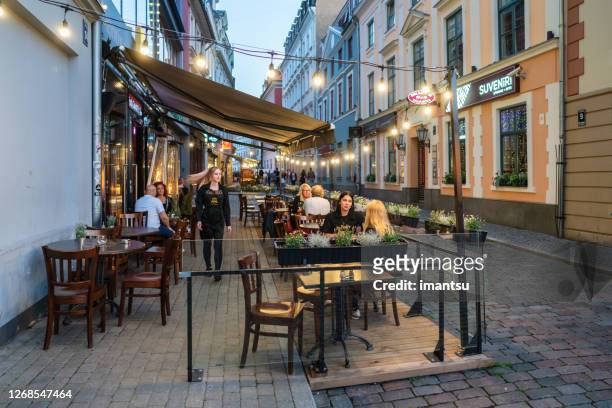 scene of old riga on a summer evening - riga stock pictures, royalty-free photos & images