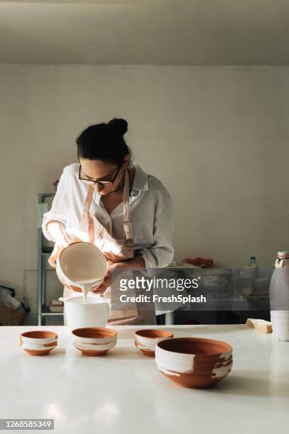 woman artisan working at her workshop - glazen pot stock pictures, royalty-free photos & images