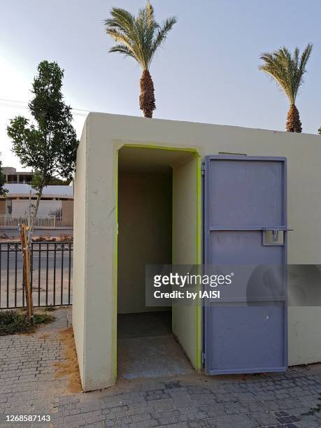 sderot, the "migunit", defence emergency bomb shelter in the streets, for protection of civilians against qassam rockets from gaza stripvertical - arab israeli conflict stock pictures, royalty-free photos & images
