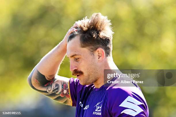 Cameron Munster looks on during a Melbourne Storm NRL training session at Sunshine Coast Stadium on August 26, 2020 in Sunshine Coast, Australia.
