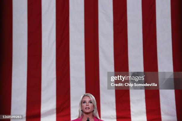 Former Florida Attorney General Pam Bondi stands on stage in an empty Mellon Auditorium while addressing the Republican National Convention on August...