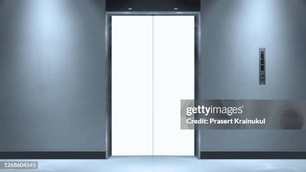 blank vertical billboard or poster on door of the elevator. - hiss bildbanksfoton och bilder