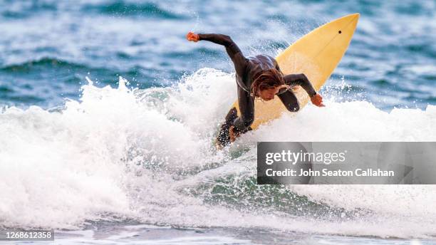 tunisia, surfing in the mediterranean sea - tunisia surfing one person stock pictures, royalty-free photos & images