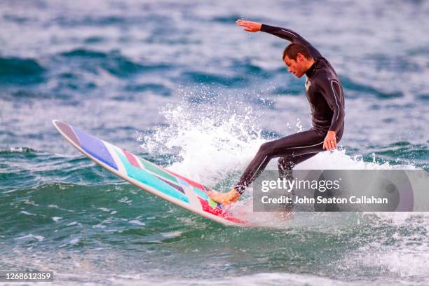 tunisia, surfing in the mediterranean sea - tunisia surfing one person stock pictures, royalty-free photos & images
