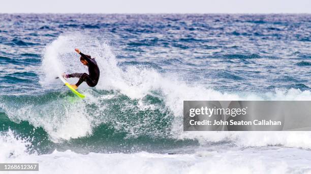 tunisia, surfing in the mediterranean sea - tunisia surfing one person stock pictures, royalty-free photos & images