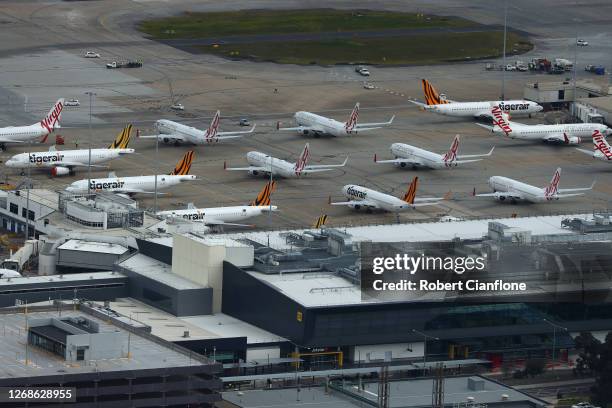 Aircraft are seen parked up at the Melbourne International Airport on August 26, 2020 in Melbourne, Australia. Melbourne is in stage four lockdown...