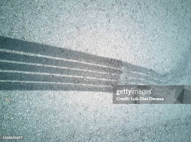 tire tracks - skid marks accident stock pictures, royalty-free photos & images