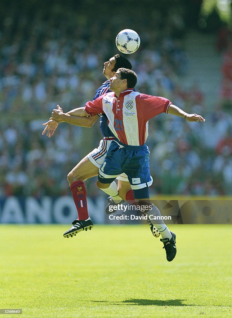 Youri Djorkaeff and Jorge Campos