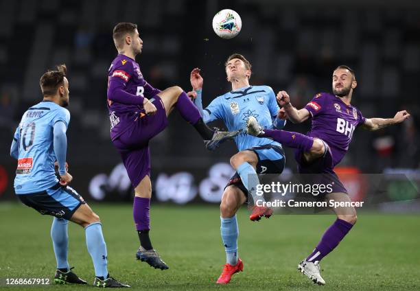 Joel King of Sydney FC is challenged by Ivan Franjic of the Glory during the A-League Semi Final match between Sydney FC and the Perth Glory at...