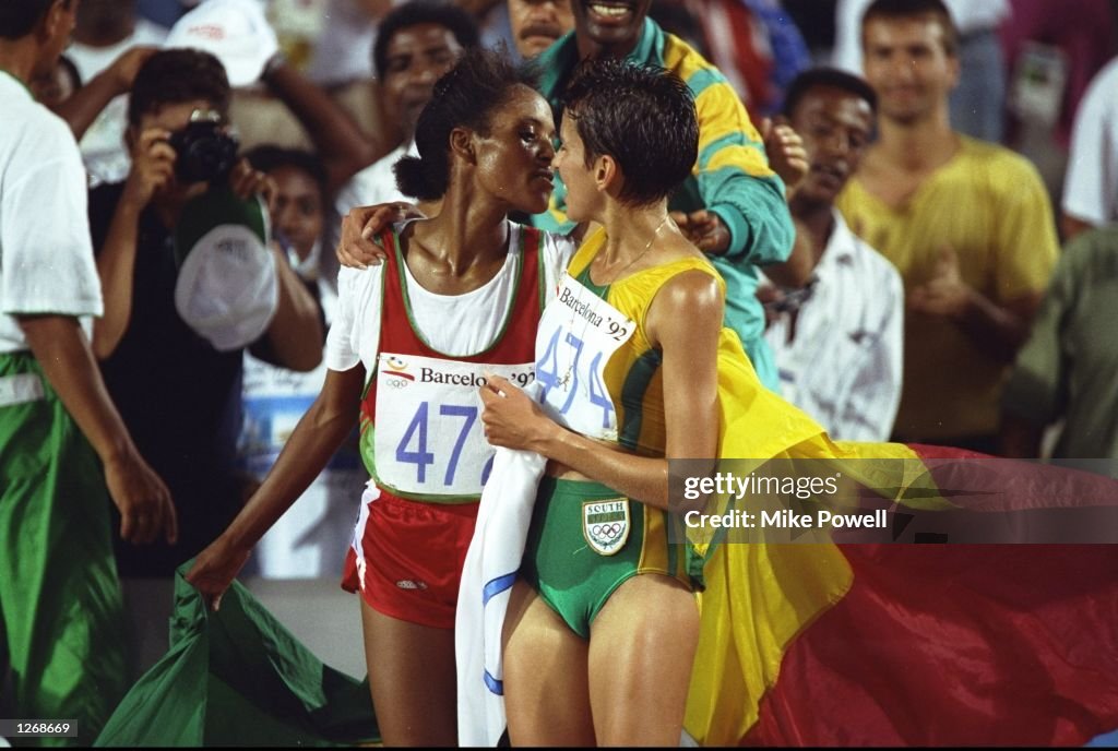 Derartu Tulu of Ethiopia is congratulated by Elana Meyer of South Africa