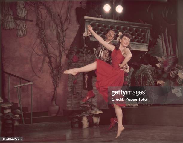 American actor Ray Bolger and Canadian actress Allyn Ann McLerie play the roles of Charley Wykeham and Amy Spettigue during the shooting of a dance...