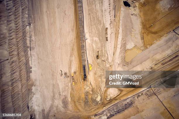 drone aerial view on large open coal pit mine - mine workings stock pictures, royalty-free photos & images