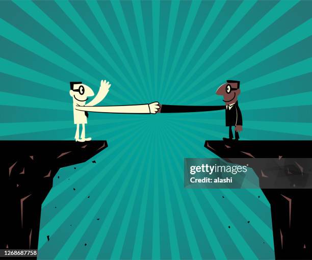 bridging the gap; two businessmen stand at the edge of the cliff and have a firm handshake - forgiveness stock illustrations