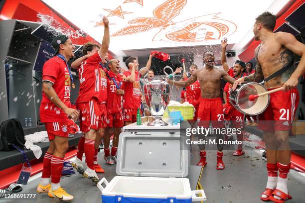 The players of FC Bayern Muenchen celebrate in the dressing room following their team's victory in the UEFA Champions League Final match against...