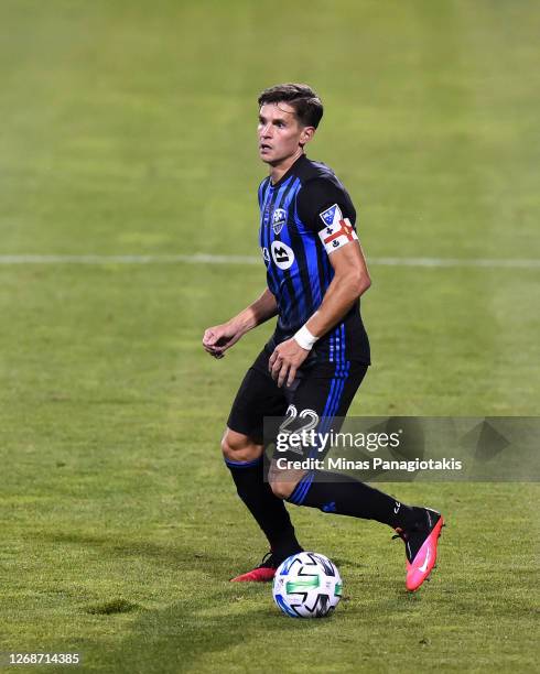 Jukka Raitala of the Montreal Impact controls the ball against the Vancouver Whitecaps during the first half of the MLS game at Saputo Stadium on...