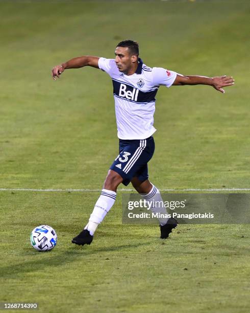 Ali Adnan of the Vancouver Whitecaps plays the ball against the Montreal Impact during the second half of the MLS game at Saputo Stadium on August...