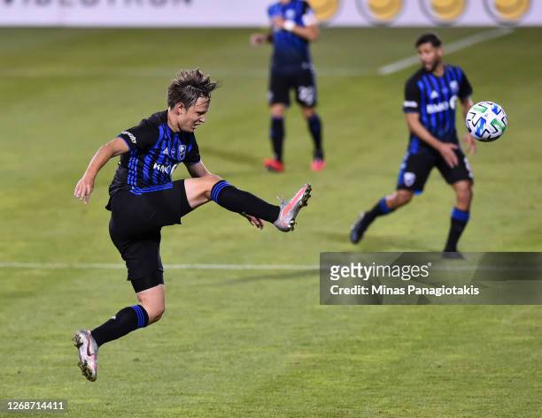 Lassi Lappalainen of the Montreal Impact plays the ball against the Vancouver Whitecaps during the first half of the MLS game at Saputo Stadium on...