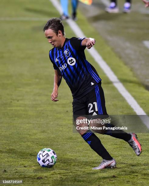 Lassi Lappalainen of the Montreal Impact controls the ball against the Vancouver Whitecaps during the first half of the MLS game at Saputo Stadium on...