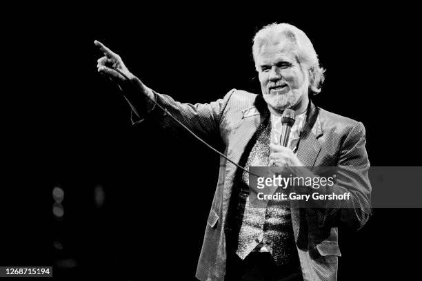 American Country musician Kenny Rogers performs onstage at Brendan Byrne Arena , East Rutherford, New Jersey, October 20, 1988.
