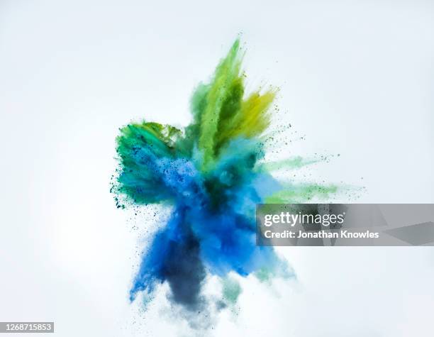 multicolor powder explosion - powder blue imagens e fotografias de stock