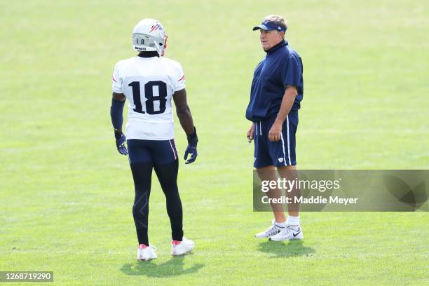 Head coach Bill Belichick of the New England Patriots talks with Matthew Slater during Patriots Training camp at Gillette Stadium on August 26, 2020...