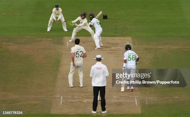 Asad Shafiq of Pakistan leaves a wide ball bowled by Dom Sibley of England as Jos Buttler prepares to catch it during the third Test match between...
