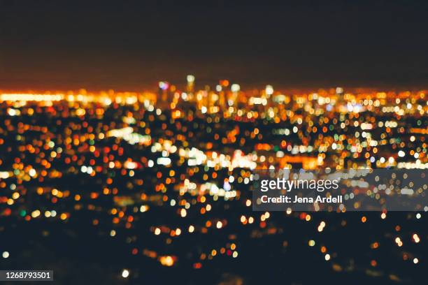 los angeles background, defocused city lights at night - photopollution stock-fotos und bilder