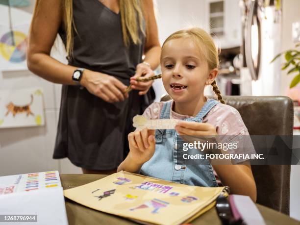 mother and daughter getting ready - girl power stickers stock pictures, royalty-free photos & images