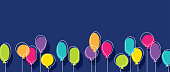 Birthday party background with colorful balloons.