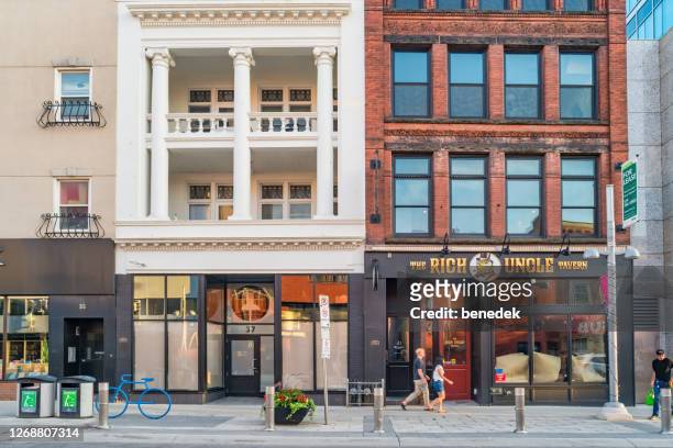 historic facades in downtown kitchener ontario canada - kitchener canada stock pictures, royalty-free photos & images