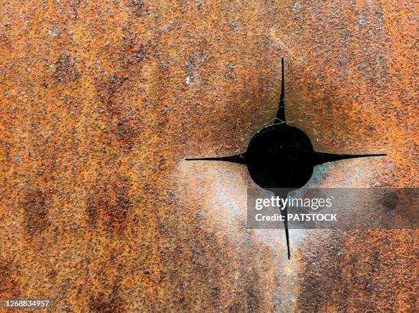 Rusty Bullets 94 Rusty Bullet Hole Stock Photos, High-Res Pictures, and Images ...