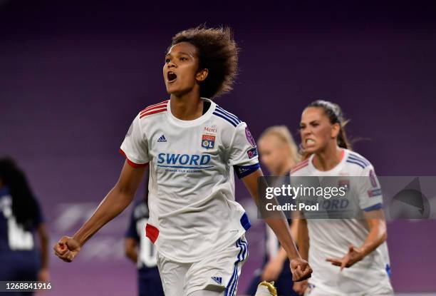 Wendie Renard of Olympique Lyonnais celebrates after scoring her team's first goal during the UEFA Women's Champions League Semi Final between Paris...