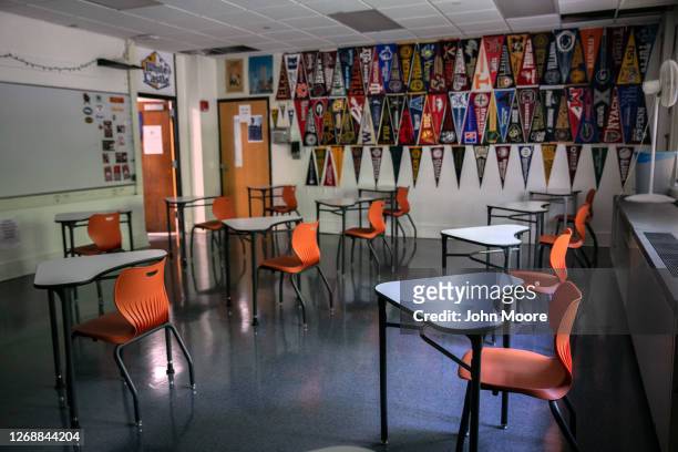 Classroom desks sit socially-distanced ahead of the return of students on August 26, 2020 in Stamford, Connecticut. Stamford Public Schools are...