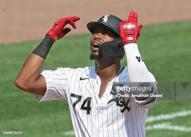 Eloy Jimenez of the Chicago White Sox celebrates as he crosses the plate after hitting a three run home run in the 5th inning against the Pittsburgh...