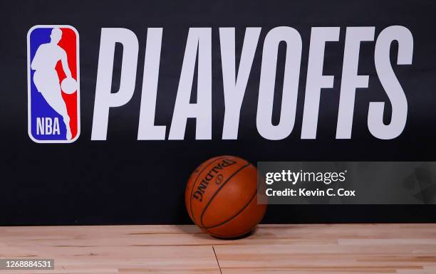 Basketball sits next to an NBA Playoffs logo in Game Five of the Eastern Conference First Round scheduled between the Milwaukee Bucks and the Orlando...
