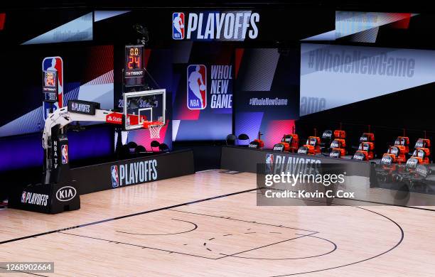 An empty court and bench is shown with the #WholeNewGame signage following the scheduled start time in Game Five of the Eastern Conference First...