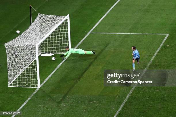 Adam Le Fondre of Sydney FC scores a goal past goalkeeper Liam Reddy of Glory during the A-League Semi Final match between Sydney FC and the Perth...