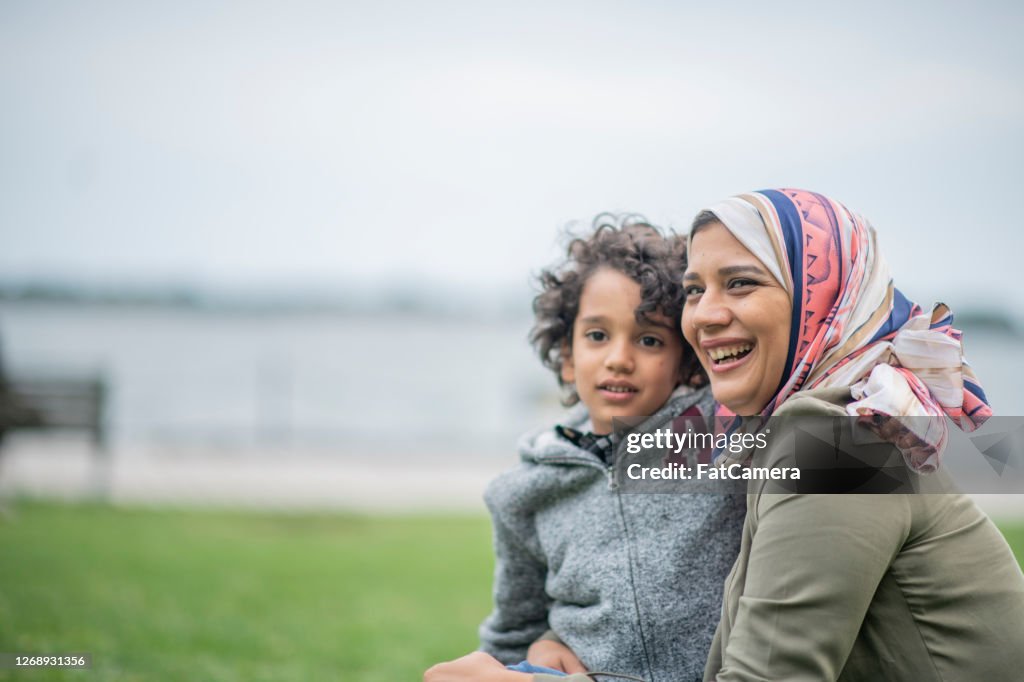 Mother and son in the city